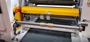 Automatic cutting and dual turret rewinding