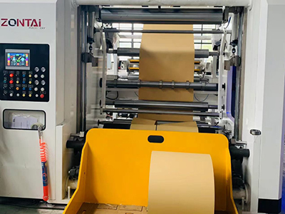 Rewind station with unload bucket which can lift up to protect rolls during running